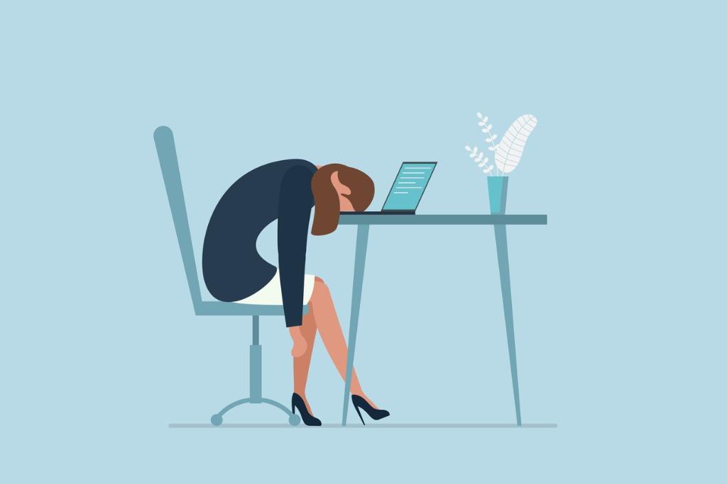 exhausted employee showing signs of stress and burnout in workplace managers must look out