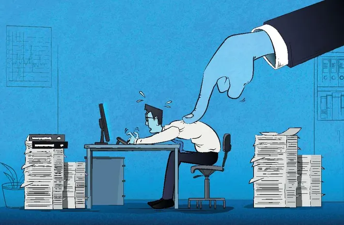 A cartoon of a man at a desk with a hand pointing at him, representing toxic work culture and the need for psychological safety australia