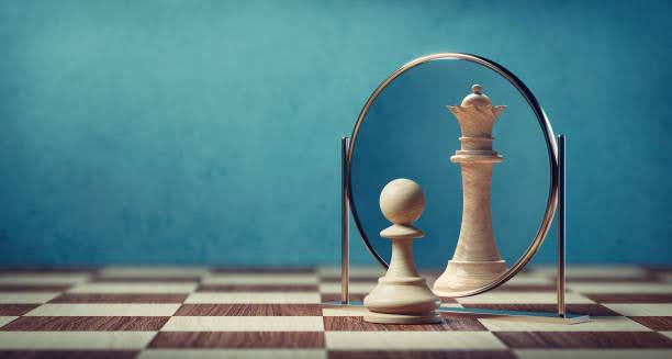A pawn looking at the mirror seeing itself as the king thus showing talents into strengths