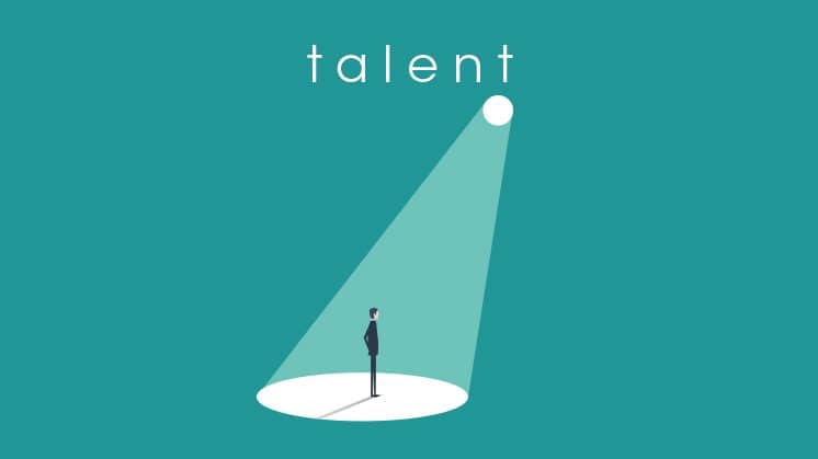 a man getting the light of a lamp through a hole in cyan showing Talent has its own path