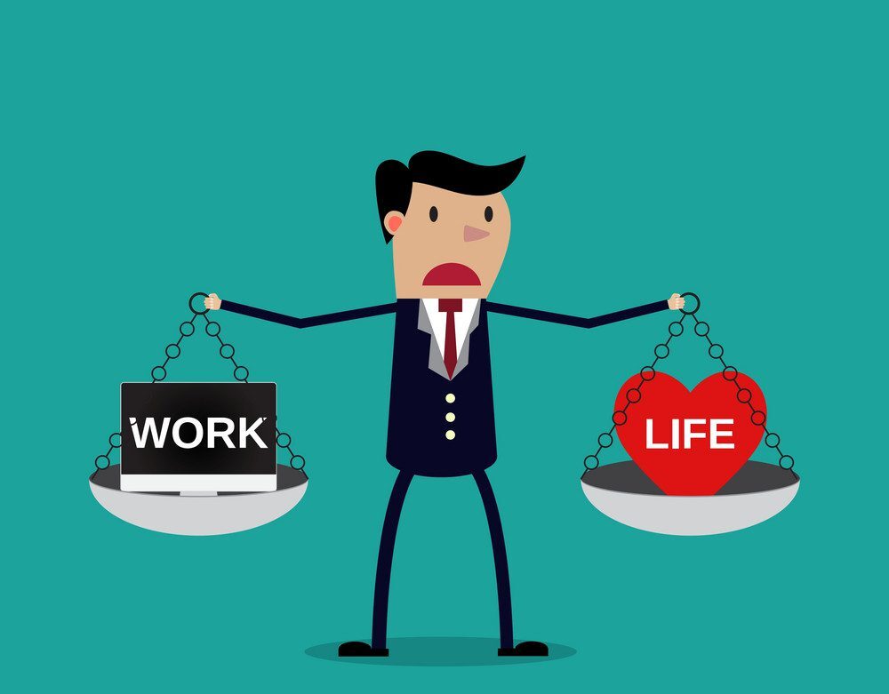 A man struggling to find the right balance between work and life and is confused with everything